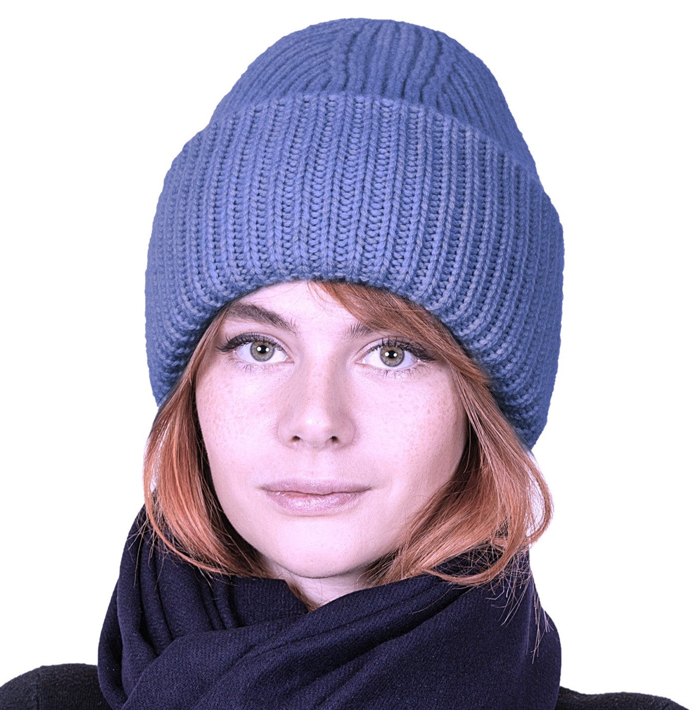 Model is wearing a thick rib beanie knit hat in blue